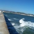 Gij&oacute;n. Rollers, bij groen baken haveningang