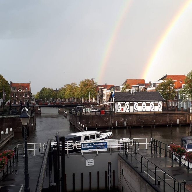 Dubbele regenboog over de haven (foto: Riveer).